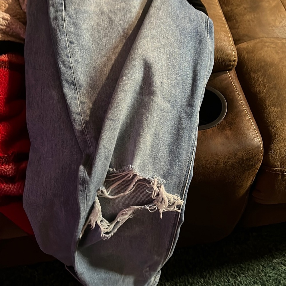 American Eagle pants curve mama jeans their size 12 long got holes at the knees